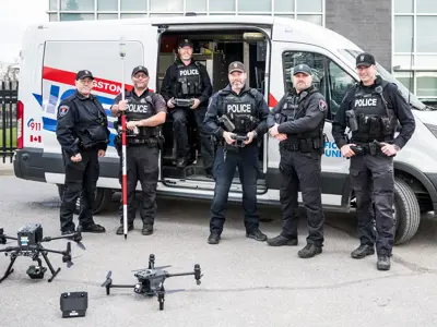 Traffic officers with drone and van